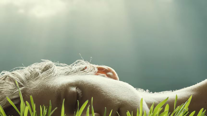 Person using natural solutions for sleep such as alternative medicine